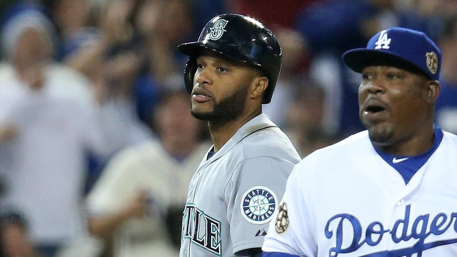 Seattle Mariners' Robinson Cano begins his swing on his first home run at  Safeco Field, in a baseball game against the New York Yankees, Wednesday,  June 11, 2014 in Seattle. (AP Photo/Ted