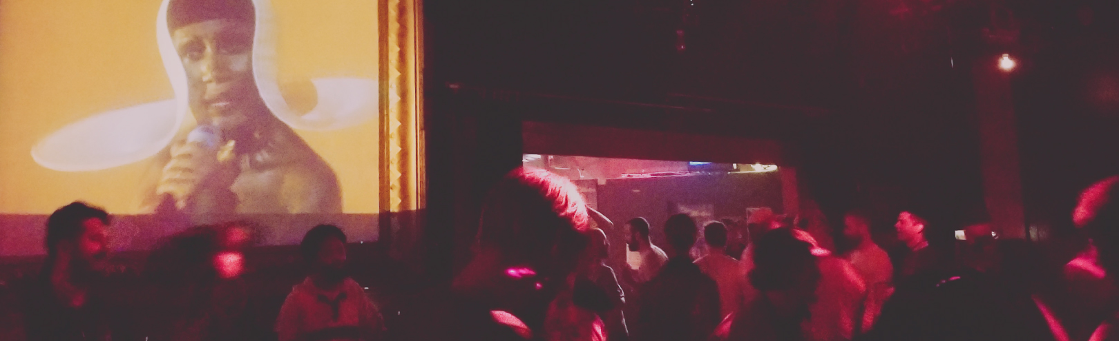 Footage of underground-music icon Grace Jones plays on a projector screen during the weekly Flammable DJ party at Rebar near downtown Seattle.