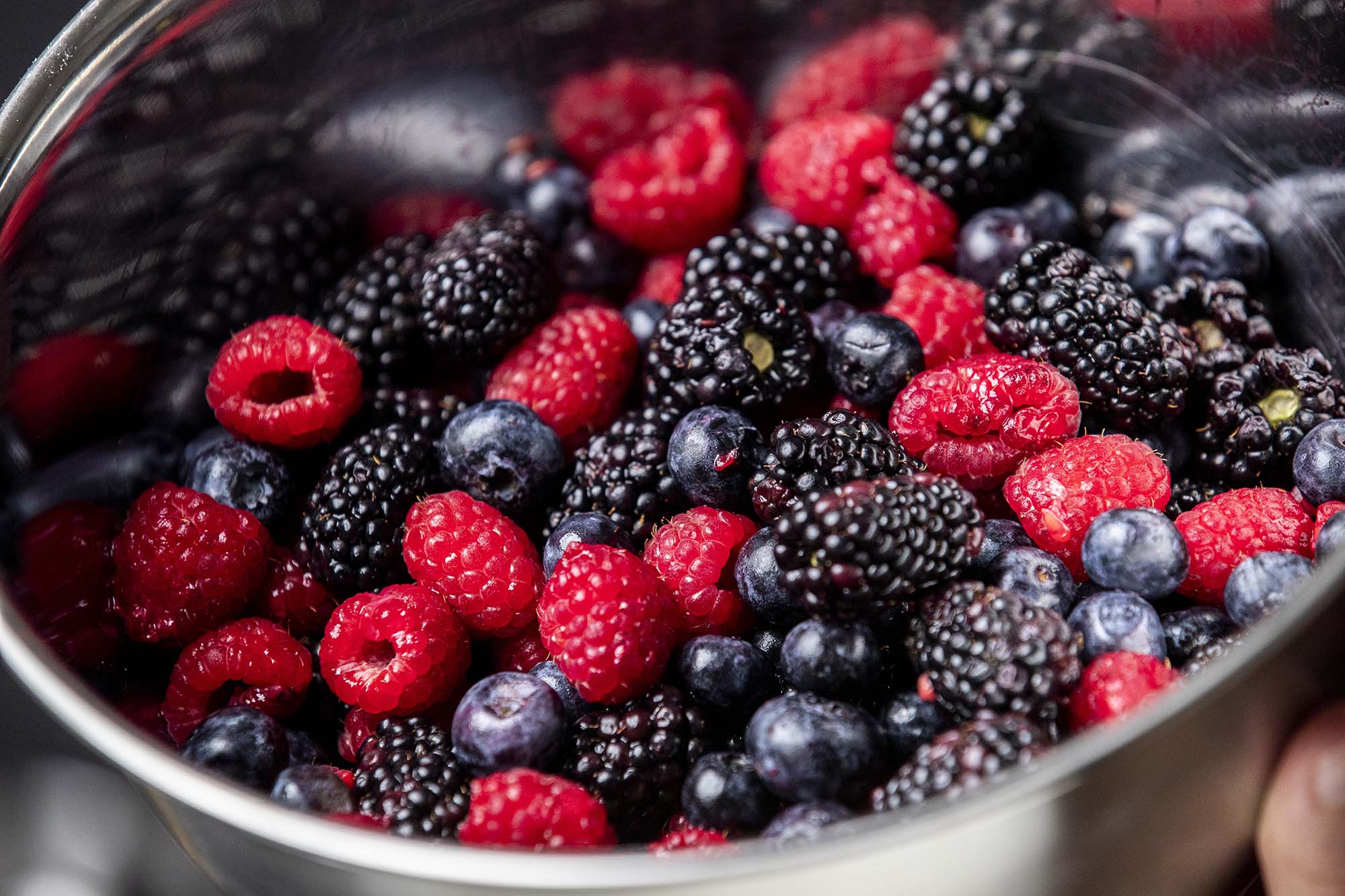 The freshly washed mixed berries for the mixed berry pie filling.