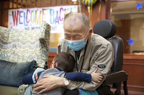 Rysic Terada, 2, gives his great-grandfather George Kozu, 94, a hug after visiting him at The Lakeshore senior-living facility. It was the first time they had seen each other indoors since the start of the coronavirus pandemic. Seattle Times reporter Paige Cornwell has closely documented the effects of the pandemic on our elderly community, particularly those in long-term care facilities, since the outbreak of the virus at Kirkland’s Life Care Center in 2020. Loneliness and isolation have been tough for many folks during the pandemic, but especially our most vulnerable. This moment in particular, photographed for Cornwell’s story about a family reuniting for the first time indoors, was a happy and hopeful one as the vaccine rollout started to offer more protection for folks in care homes and allow reopening for visitation.