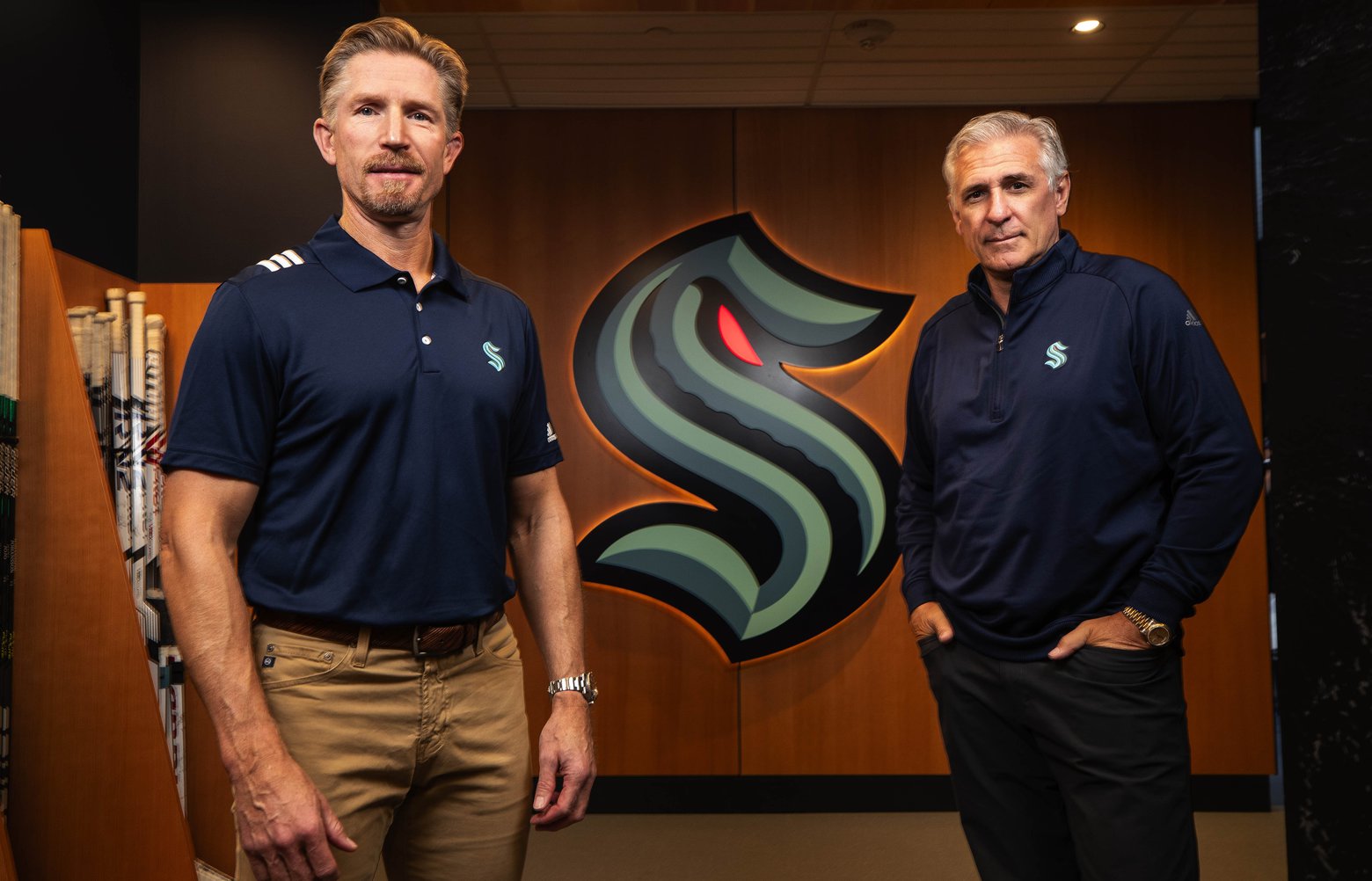 Seattle Kraken coach Dave Hakstol, left, and GM Ron Francis hope to have a hard-working, relentless team. (Dean Rutz / The Seattle Times)