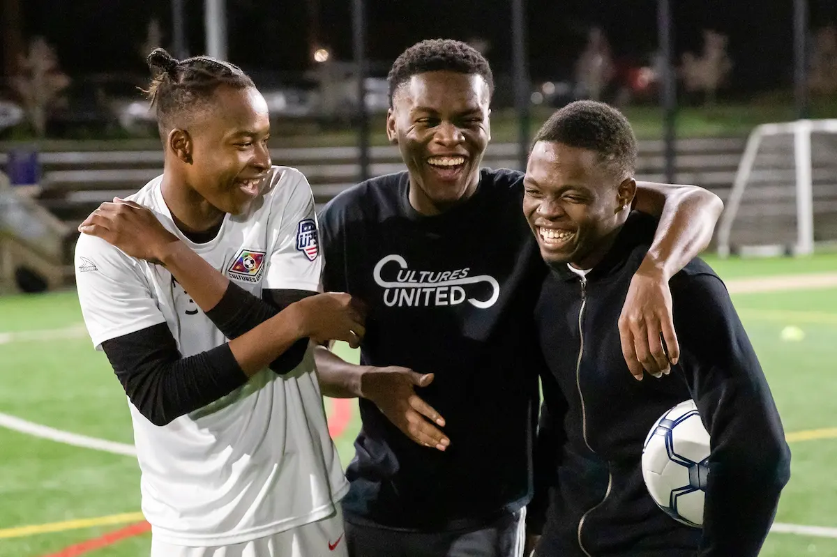 From left, Kevin Mayamba, Asael Tshitambwaand Deineth Avila share a laugh during a Cultures United practice in White Center. “Soccer is the most beautiful game you could ever watch and play. It’s like art. It’s like music,” said Mayamba. I was looking for a genuine moment and not just people kicking a ball around. I also shot lots of photos of people kicking a ball around. I waited for the team to huddle and looked for a person with a strong outgoing personality and waited ... and waited. The results are thus, and many times, moments are the in-betweens.